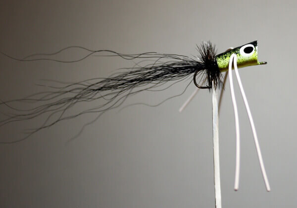 Willow Bug with a black over chartreuse body, black hackle, black tail and white rubber legs